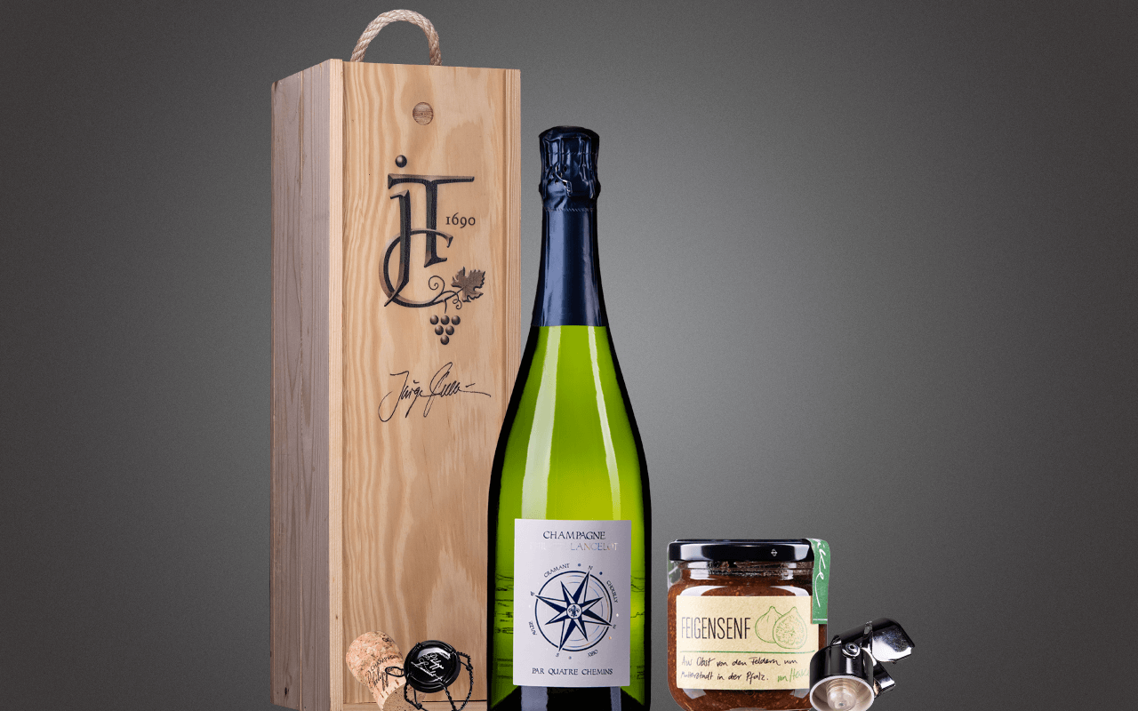 JTC 1er Holzkiste "Grand Cru Champagner mit Feigensenf" als Präsent verpackt (Abholpreis Vinothek) JTC 1er Holzkiste "Grand Cru Champagner mit Feigensenf" als Präsent verpackt (Abholpreis Vinothek)
